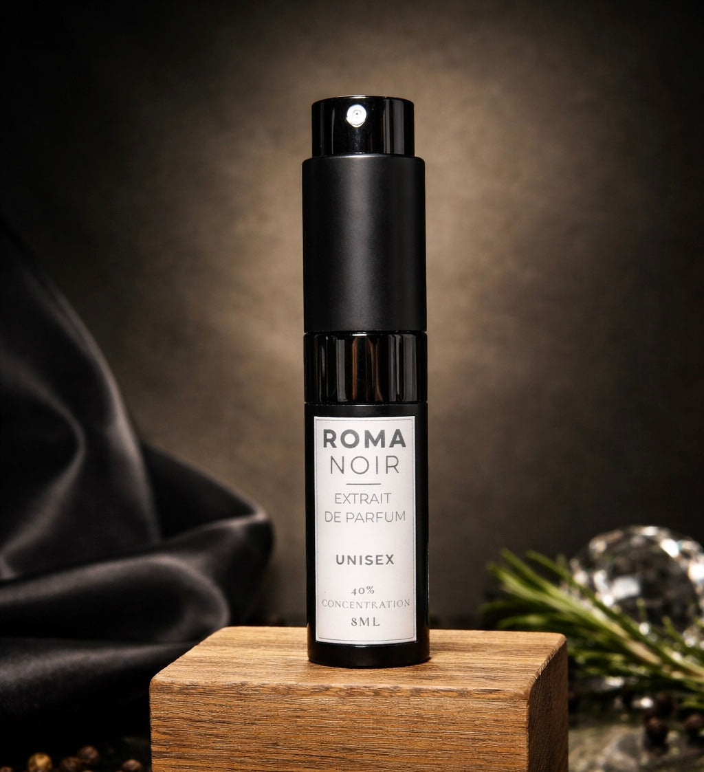 Sleek black 8mL Roma Noir travel perfume atomizer on a minimalist background