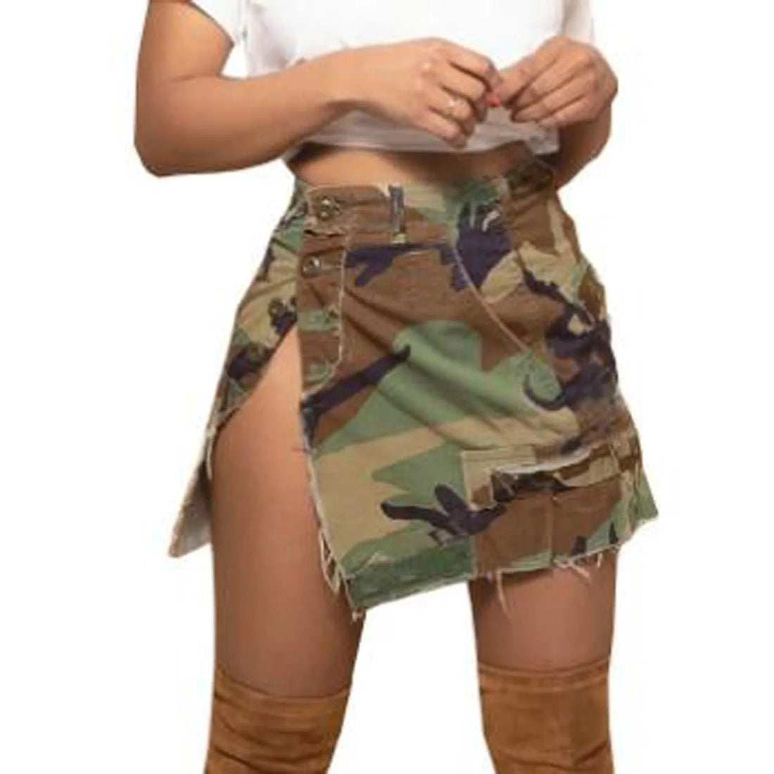 A woman wearing a trendy camouflage mini skirt with an asymmetrical hem, side button closure, and cargo pockets, styled with a white top and brown boots.