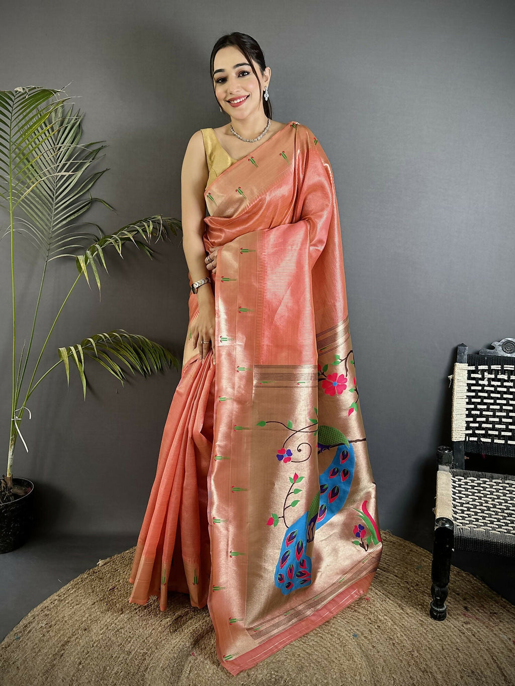 Light Orange Tissue Paithani Saree with detailed peacock and floral motifs and matching blouse fabric