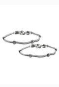 Traditional German Silver Anklets featuring intricate metallic craftsmanship
