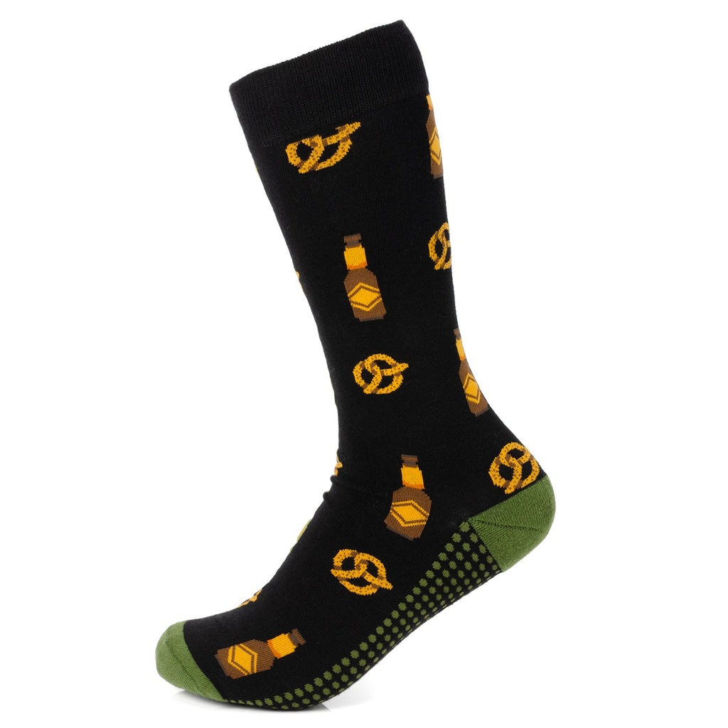 Men's black crew socks featuring a pattern of beer bottles and soft pretzels with green toe and heel details.