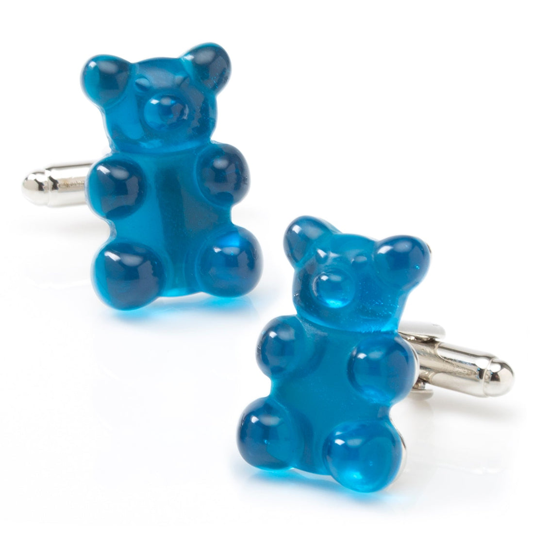 A pair of blue gummy bear shaped cufflinks made of clear blue resin and silver-tone metal backings.