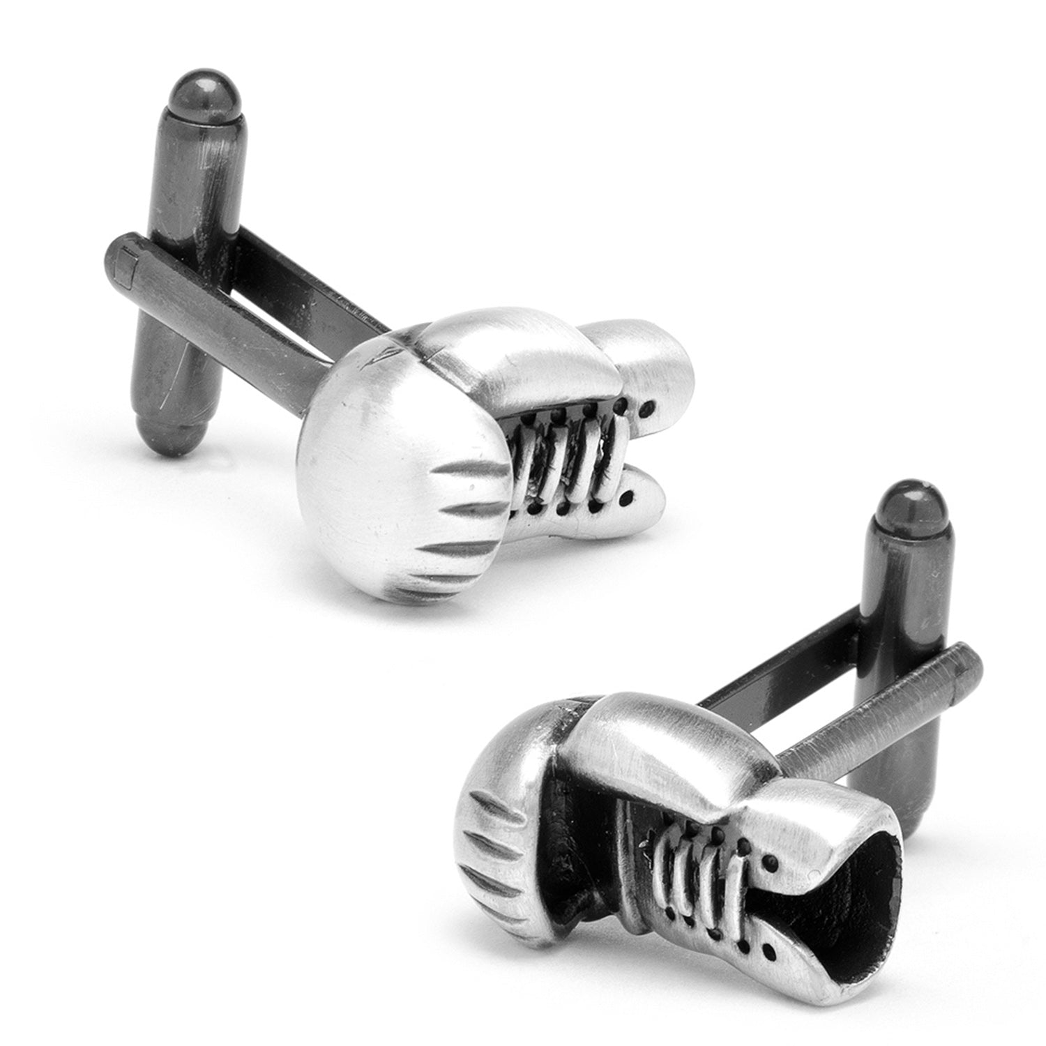 A pair of antique silver boxing glove cufflinks featuring a detailed lace design and secure bullet backings.