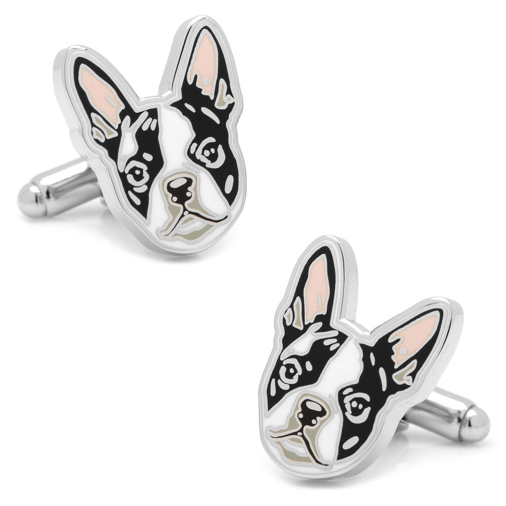 A pair of silver plated cufflinks shaped like Boston Terrier dog faces with black, white, and pink enamel details.