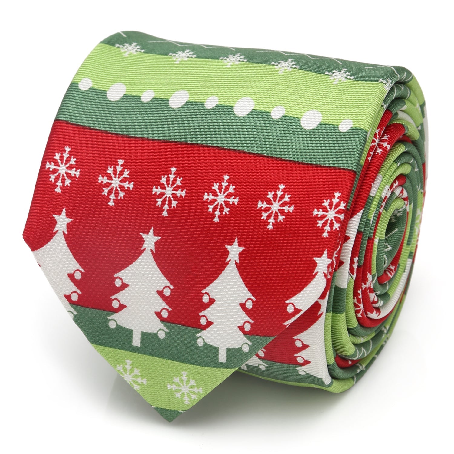 A close-up view of a rolled silk necktie featuring a repeating pattern of white Christmas trees and snowflakes on a red and green background.