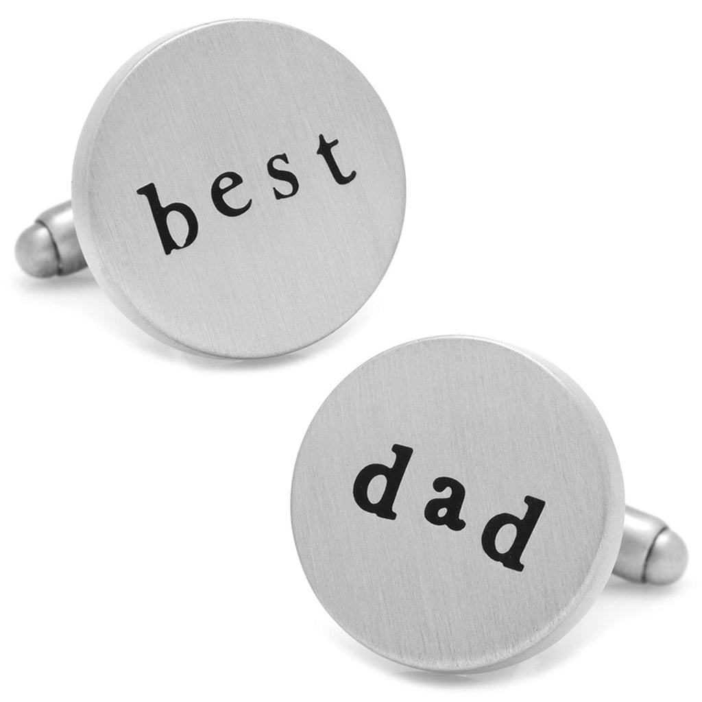 Round brushed silver tone cufflinks engraved with Best on one and Dad on the other, shown against a white background and on a blue dress shirt cuff.