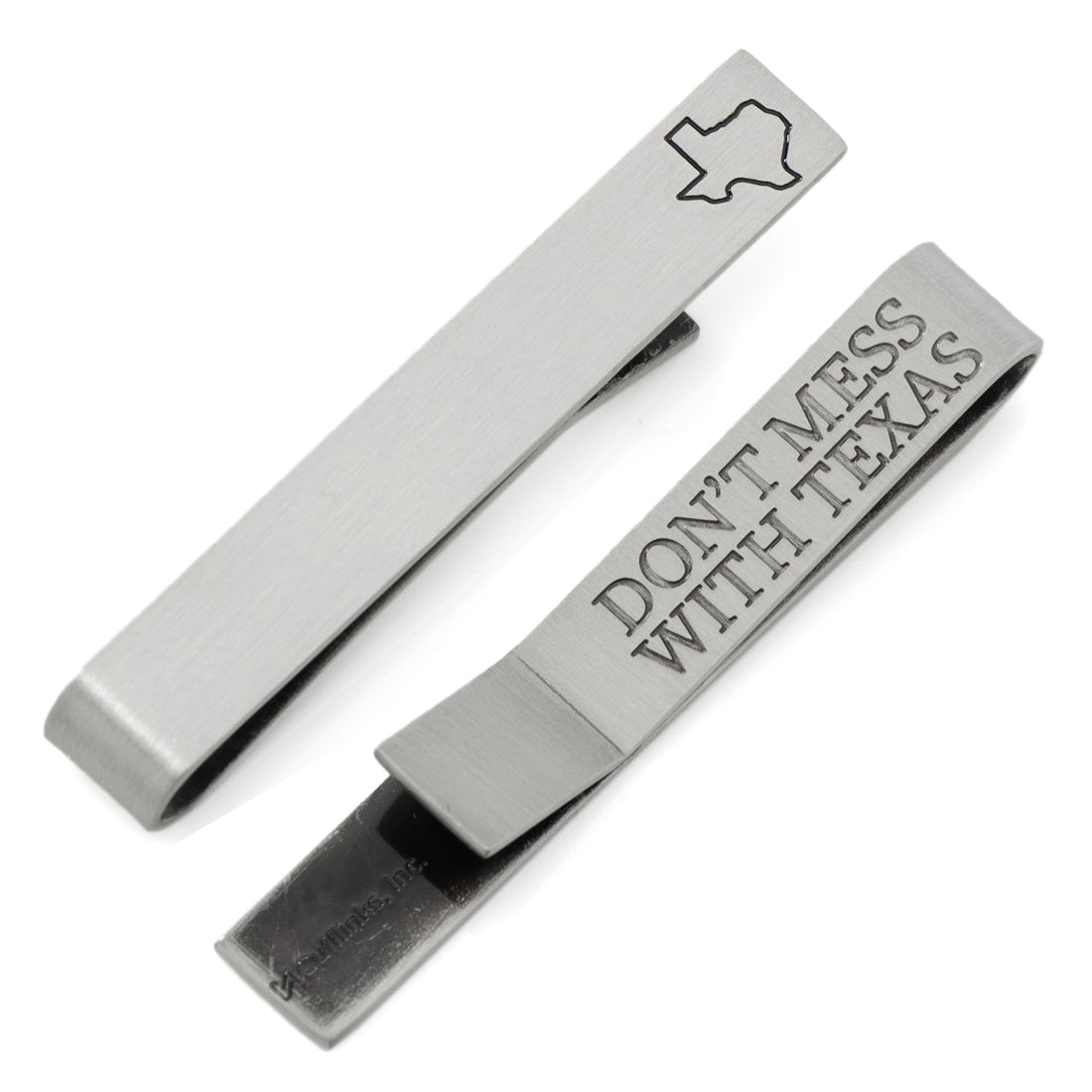 Antique silver tie bar featuring a recessed Texas state outline on the front and the text Don't Mess With Texas engraved on the back.