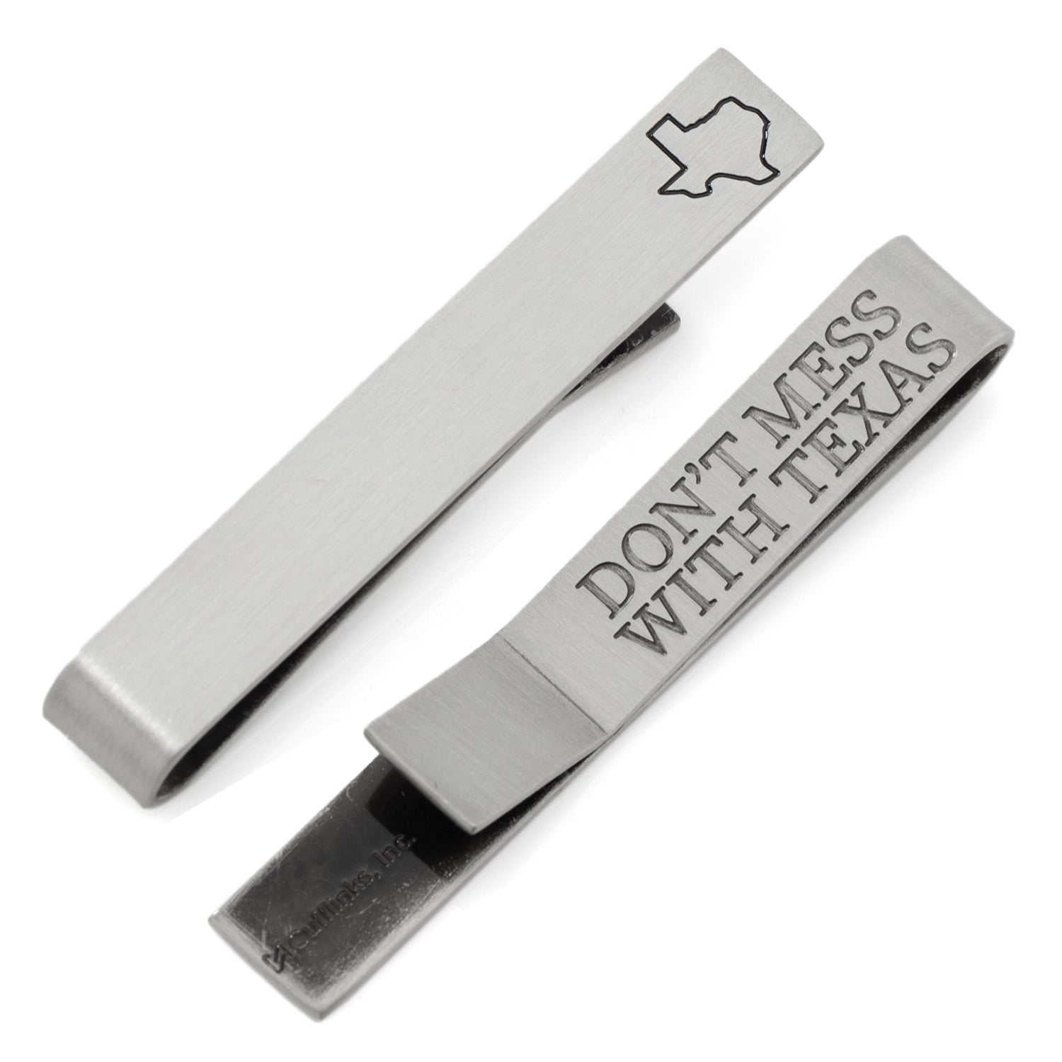 Antique silver tie bar featuring a recessed Texas state outline on the front and the text Don't Mess With Texas engraved on the back.