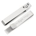 Silver tone tie bar with engraved eagle design and hidden message on the reverse side