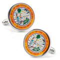 Close up of Florida State Seal cufflinks featuring a silver base and colorful enamel face on a white background.