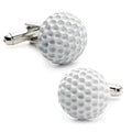 A pair of white enamel golf ball shaped cufflinks with a silver-tone bullet backing.