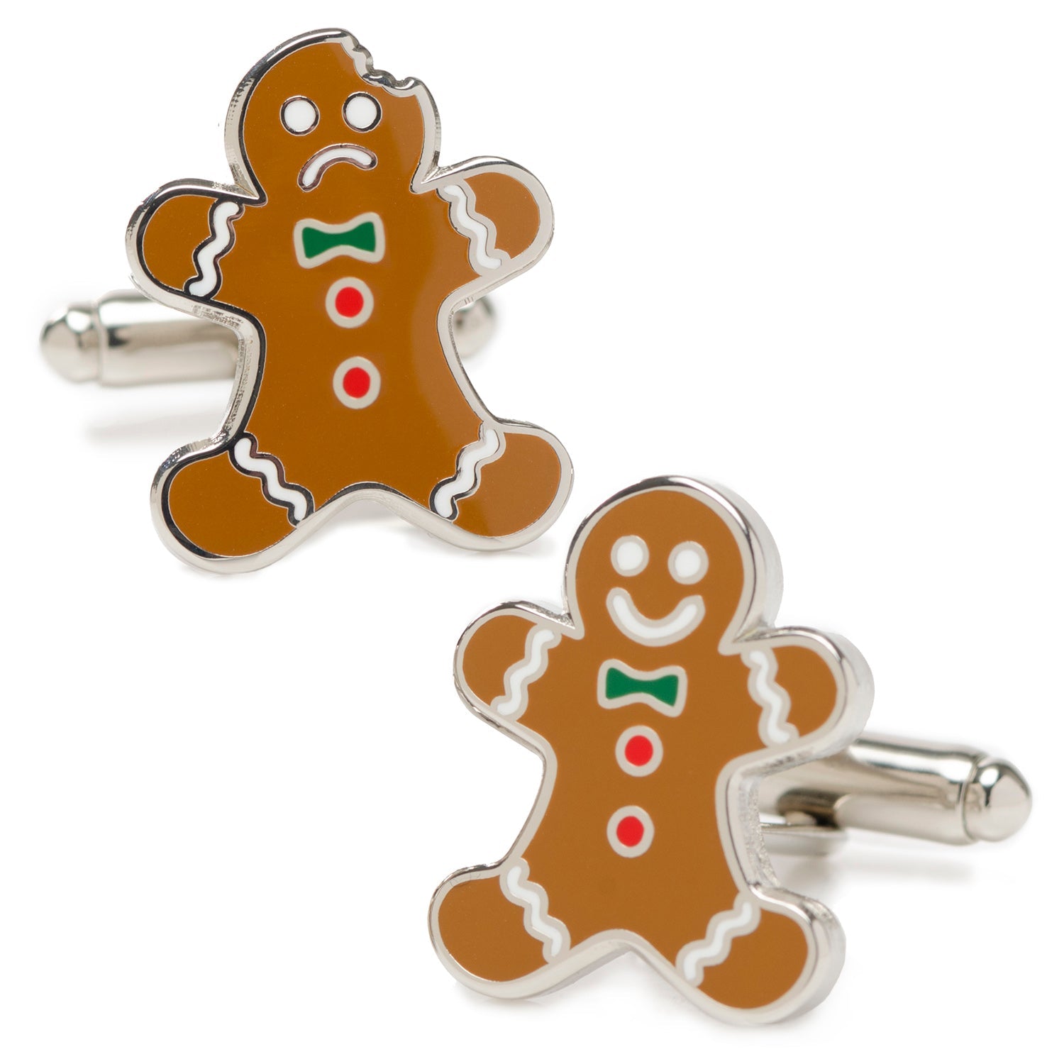 A pair of novelty gingerbread man cufflinks featuring one smiling cookie and one cookie with a bite taken out of it.