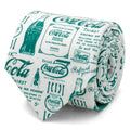 Close up rolled view and back label view of a white necktie with green vintage Coca-Cola bottle and advertisement print