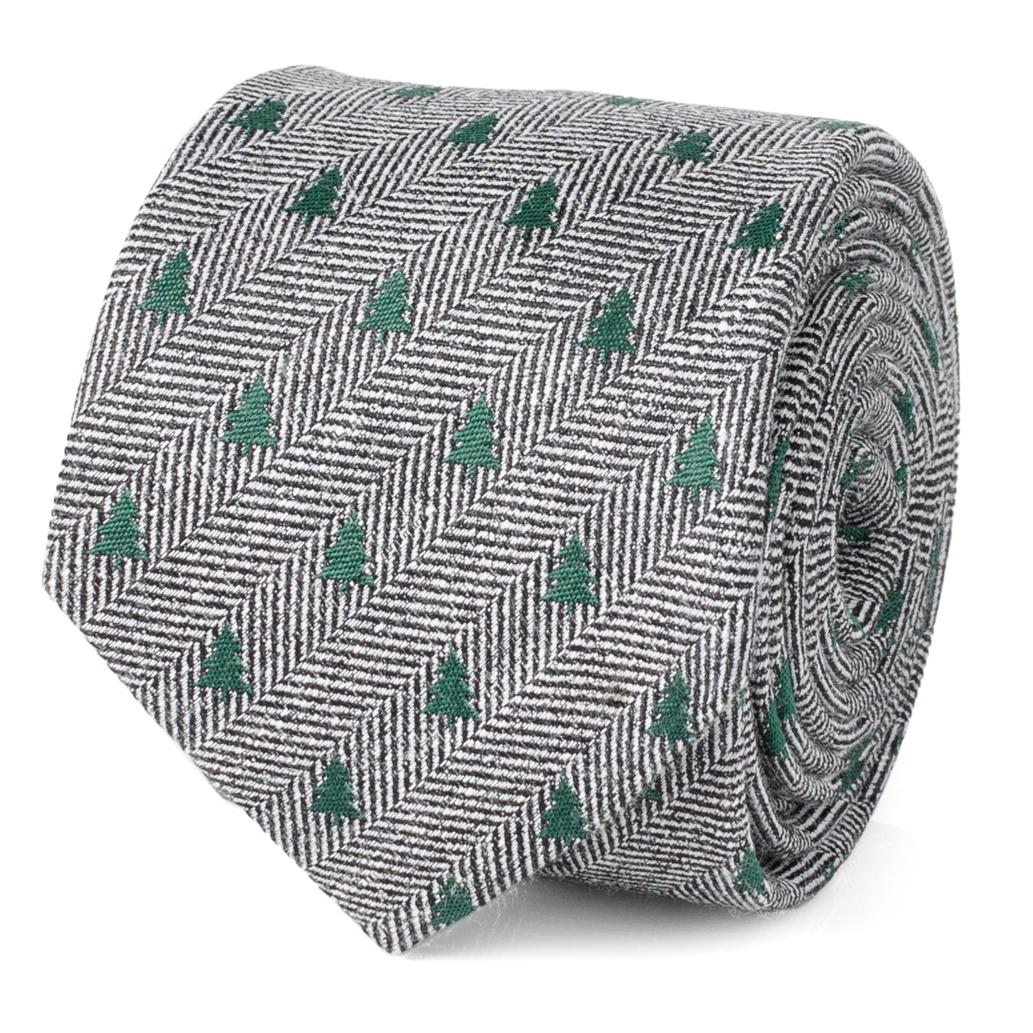 Close-up of a grey and white herringbone necktie featuring small green Christmas tree patterns, shown tied on a mannequin.