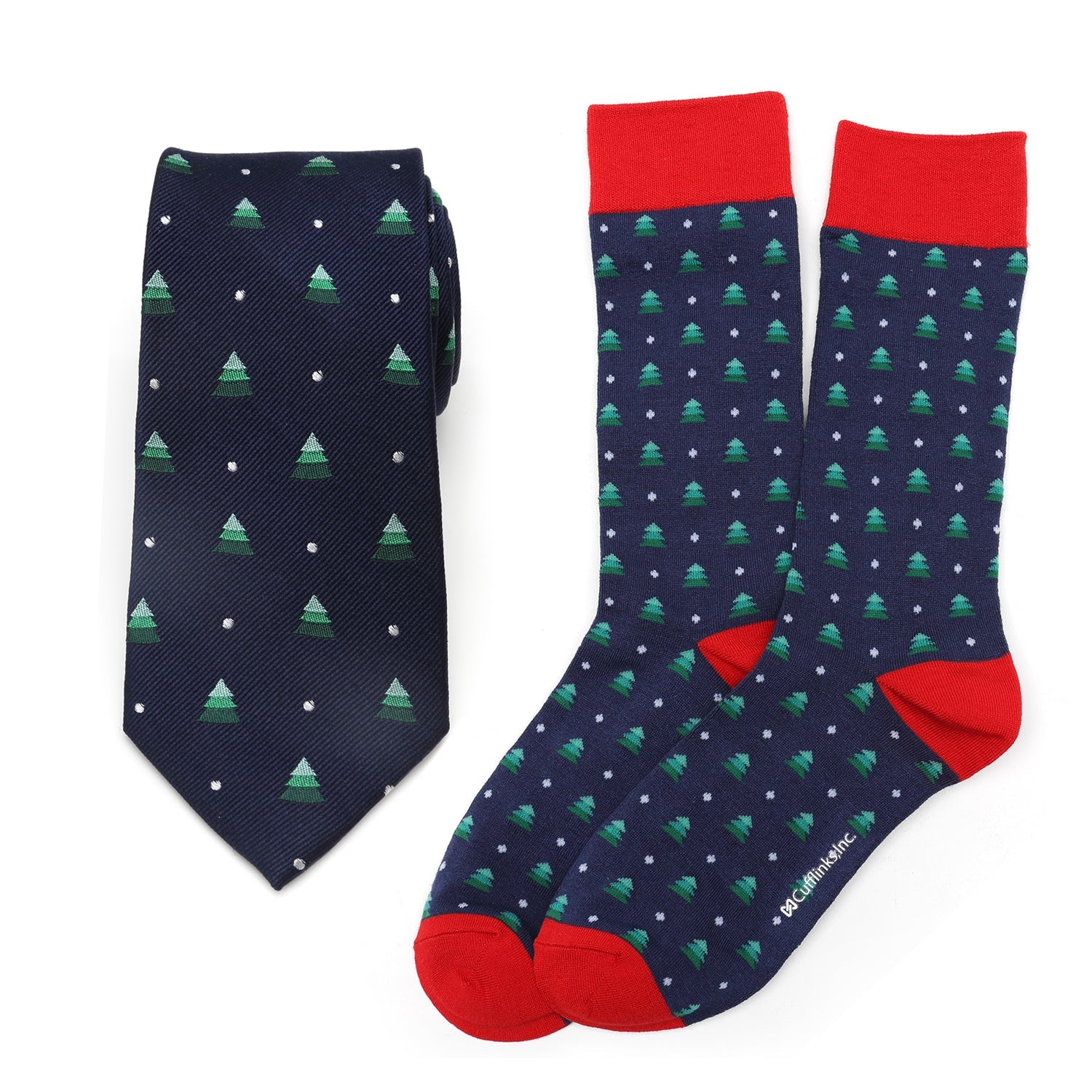 Holiday tree print necktie and matching navy blue socks with red accents in a gift box
