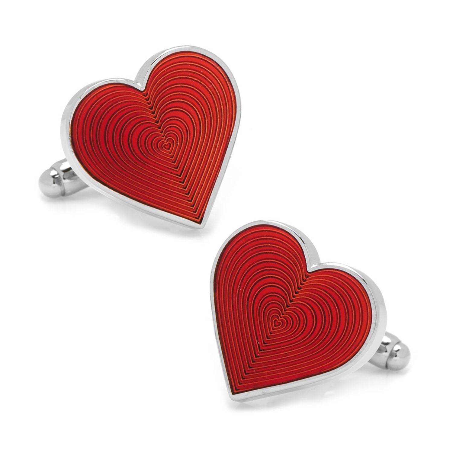 A pair of silver-toned cufflinks with a heart-shaped design filled with red transparent enamel and etched concentric lines.