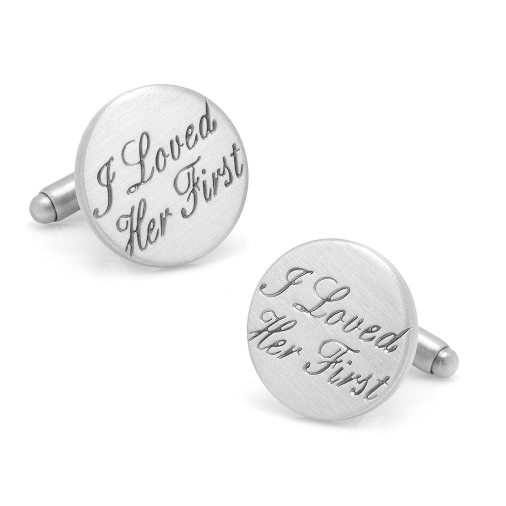 A pair of round antique silver plated cufflinks engraved with I Loved Her First