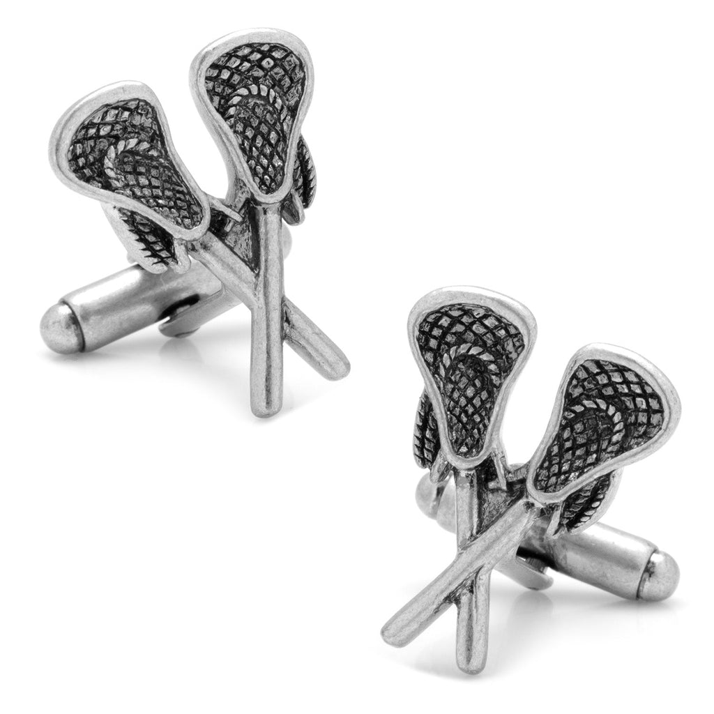 A pair of silver tone cufflinks featuring a detailed 3D design of two crossed lacrosse sticks.