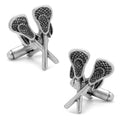A pair of silver tone cufflinks featuring a detailed 3D design of two crossed lacrosse sticks.