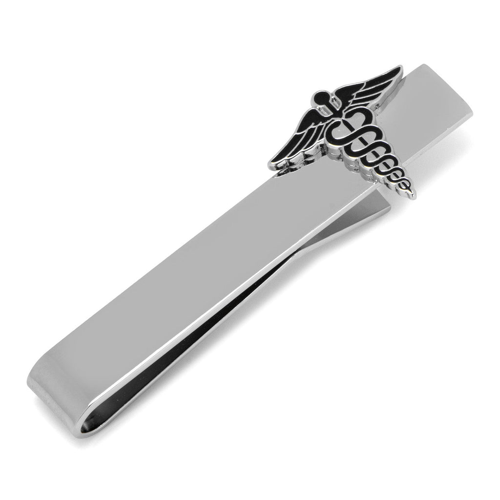 Silver-tone tie bar with a black enamel Caduceus symbol attached to a black necktie.