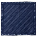 A navy blue silk pocket square with a light blue diagonal stripe and a border pattern of sailboats, fishing poles, and fish.