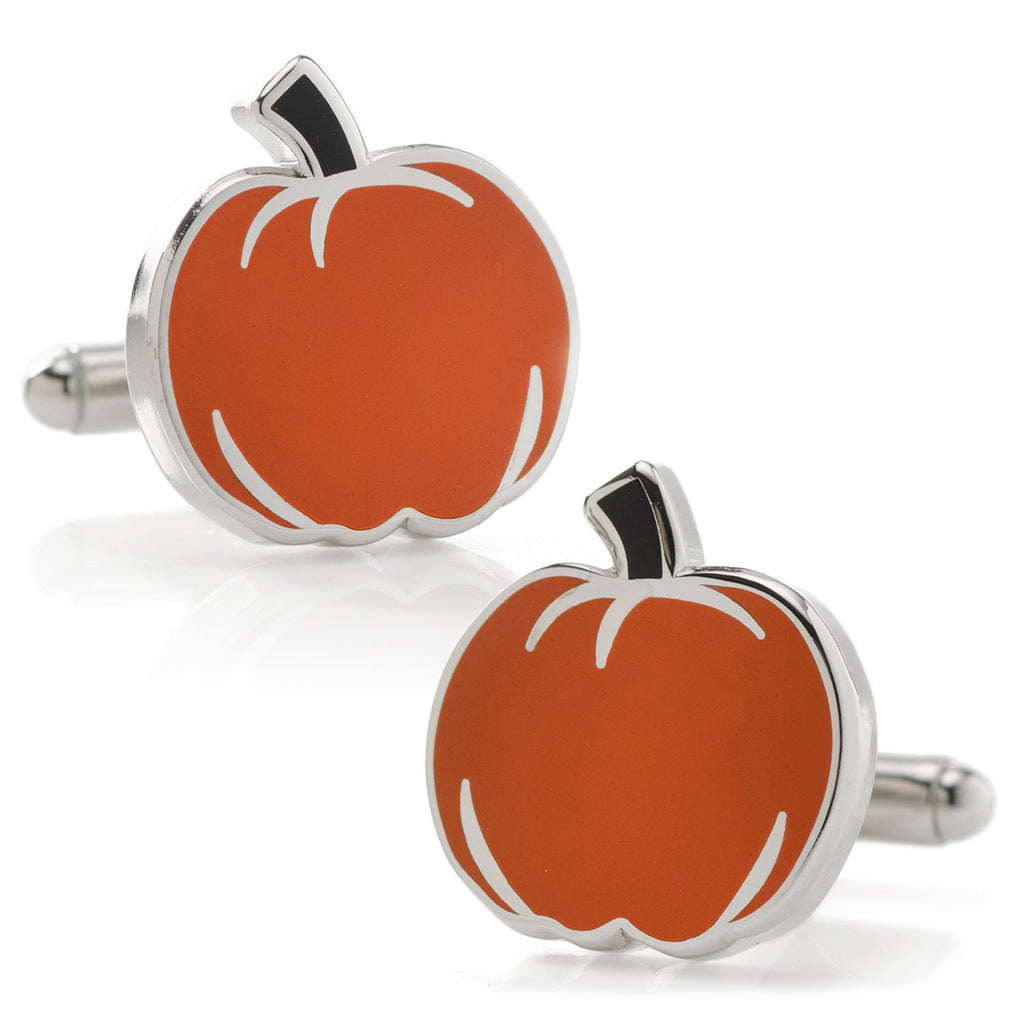 A pair of orange and black pumpkin-shaped enamel cufflinks on a white background.