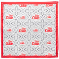 A square satin Diet Coke scarf featuring a grey and white geometric pattern with a vibrant red border and red Diet Coke logos.
