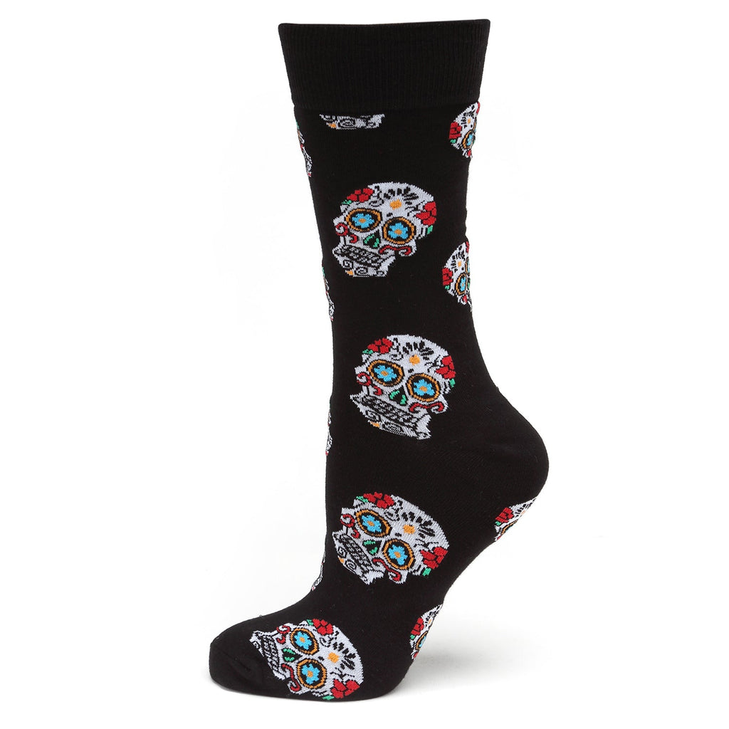 Black crew socks featuring a repeated white, red, and blue sugar skull pattern.