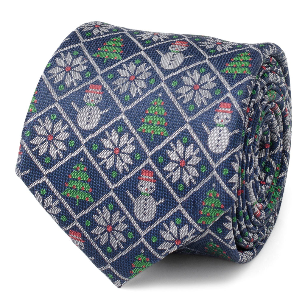 Close up of a blue silk men's necktie with a diamond pattern of snowmen, snowflakes, and christmas trees.