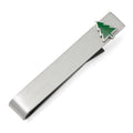 Silver tie bar with small green enamel Christmas tree design on a grey herringbone tie.