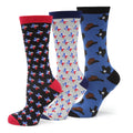 Three pairs of Texas-themed crew socks, including flag and cowboy hat designs, displayed with a gift box.