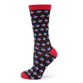 A pair of black crew socks featuring a repeating Texas state flag pattern with red, white, and blue details and red cuffs, heels, and toes.