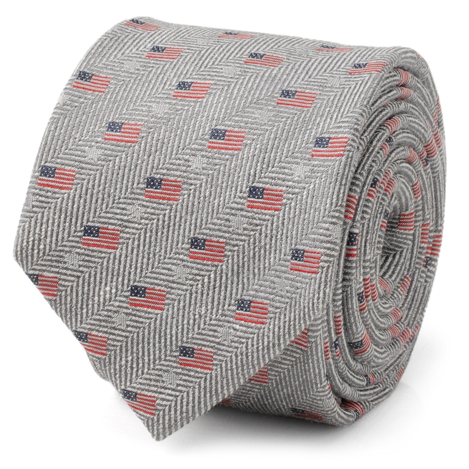 A light gray necktie featuring a herringbone pattern and small American flag prints, shown in a roll and on a mannequin.