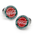 Round silver-tone cufflinks with red and green vintage Coca-Cola logo design.