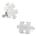 Silver tone puzzle piece cufflinks showing engraved text She Said Yes and I Do