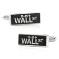 A pair of rectangular cufflinks featuring a black and white Wall Street sign design.