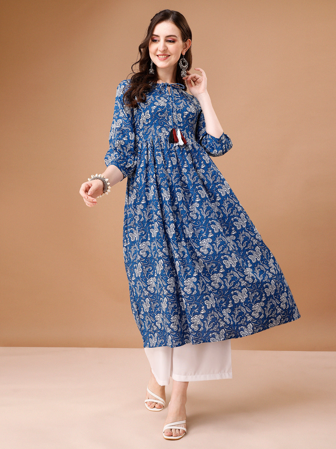 Multicolor floral printed flared kurta with tie-up round neck detail