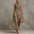 Green and pink graffiti print mesh maxi dress with suspender straps and an irregular hem slit