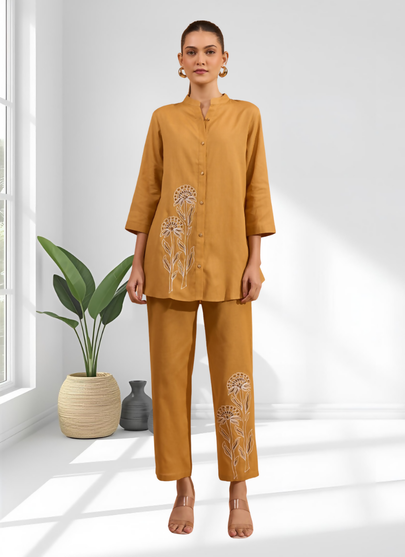 Coral cotton and linen co-ord set featuring intricate embroidery and a mandarin collar