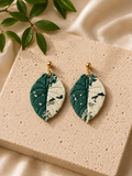 Handmade Alocasia Maharani Albo polymer clay earrings with green and white botanical patterns