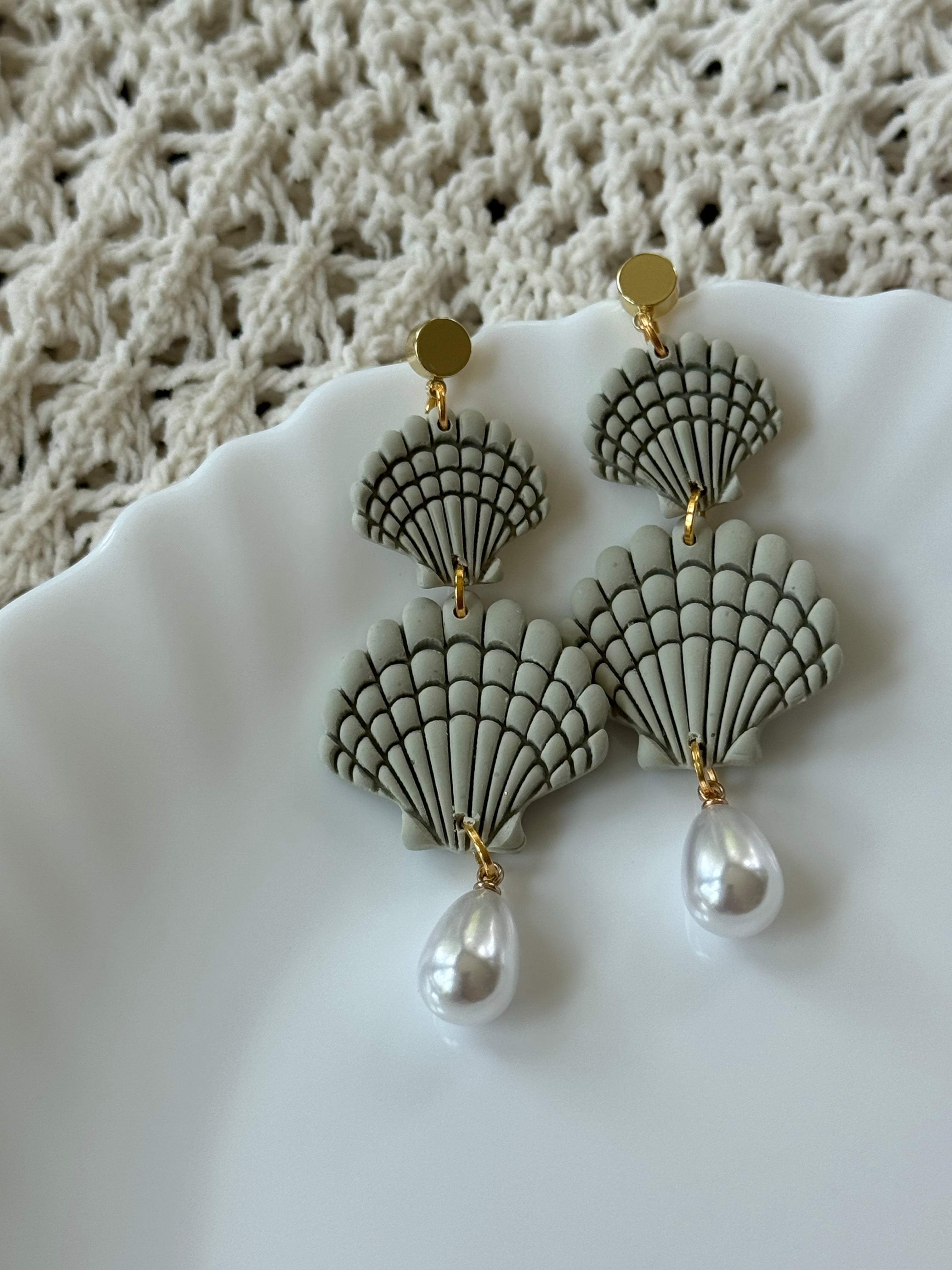Shelley earrings in seafoam green and white polymer clay with gold hardware.