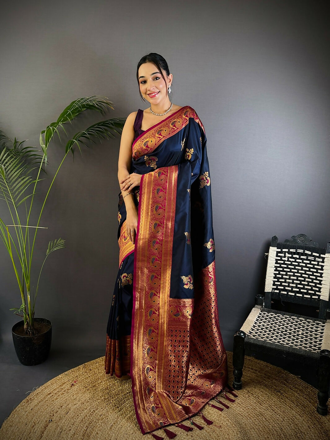 Navy Blue Banarasi soft silk saree with intricate woven patterns and matching blouse