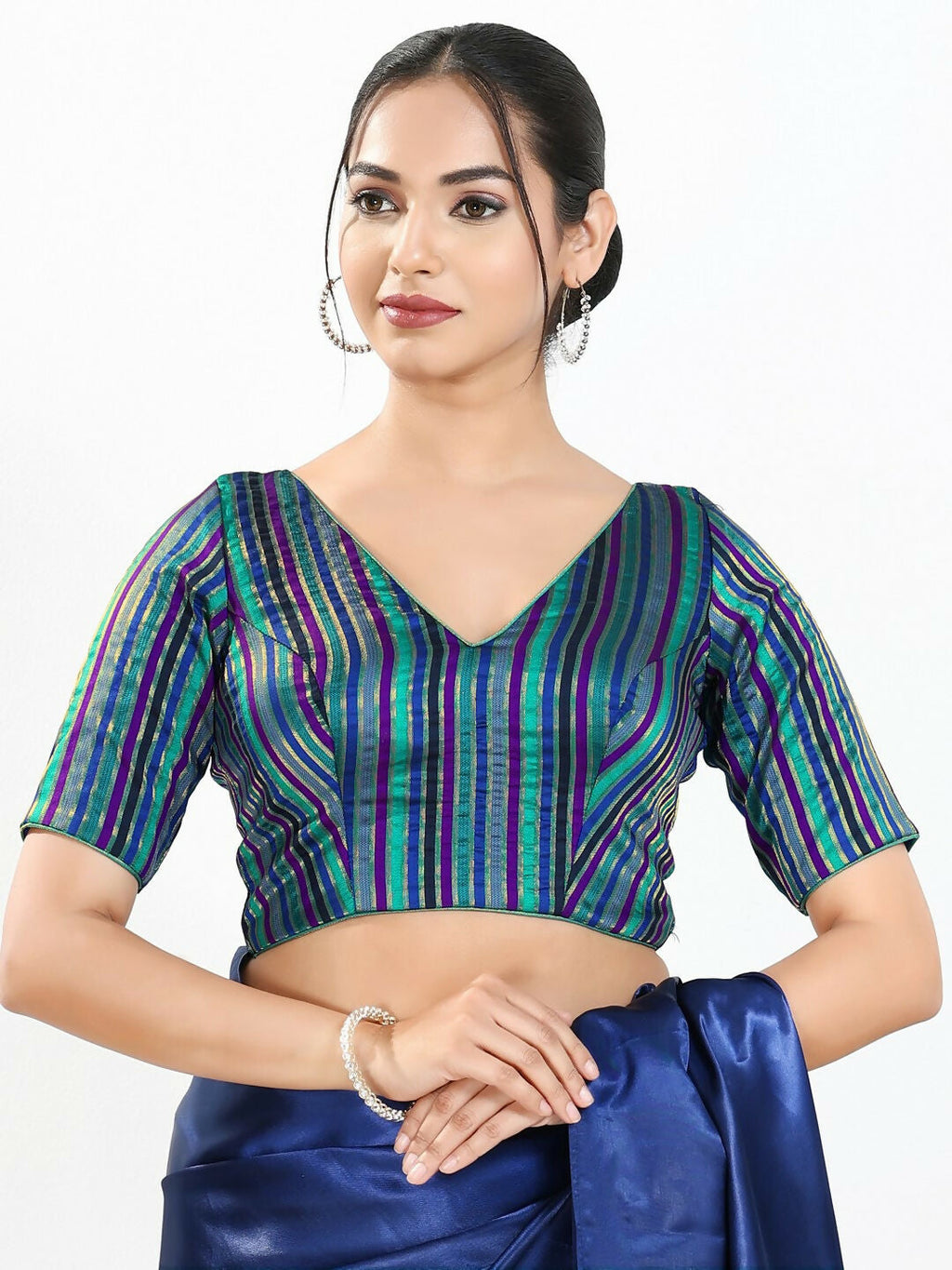 Blue multi brocade fabric blouse with V-neck and elbow sleeves