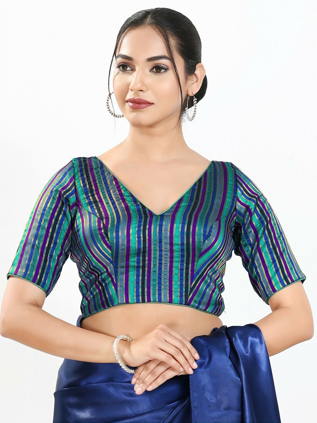 Blue multi brocade fabric blouse with V-neck and elbow sleeves