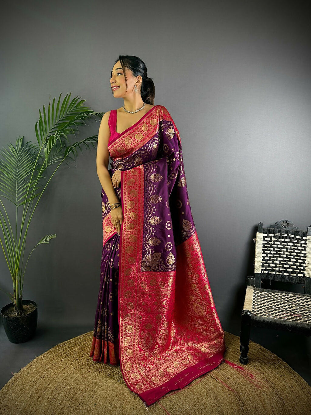 Bright magenta Banarasi soft silk saree with butti details and unstitched blouse