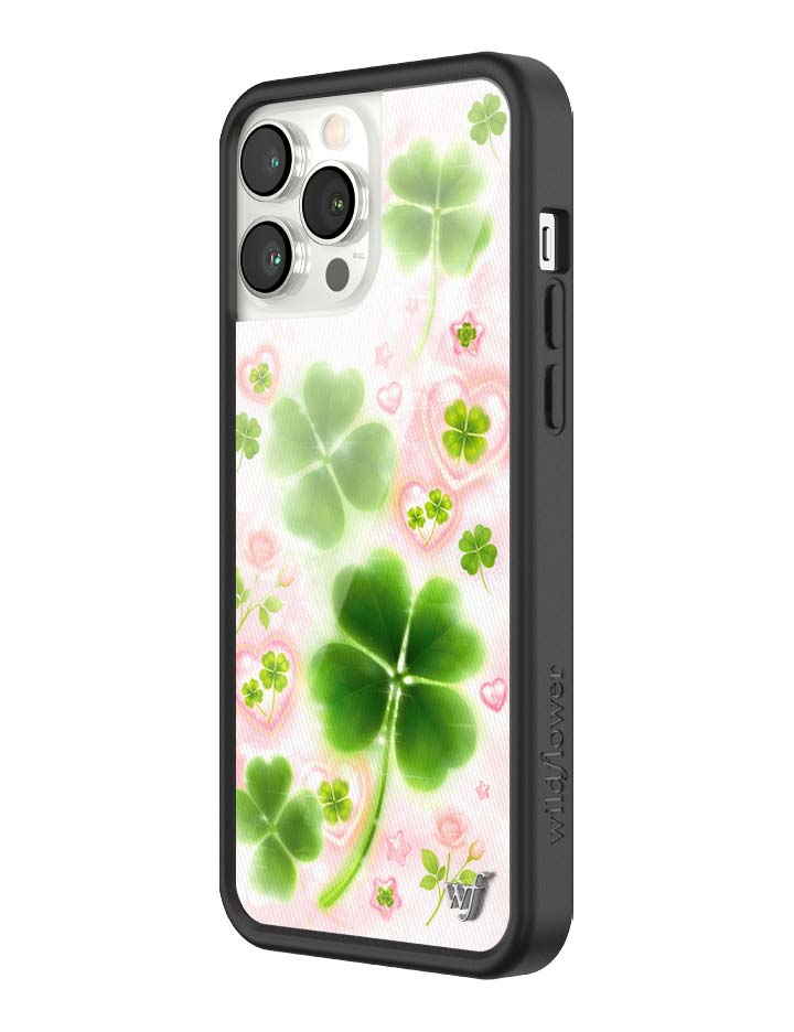 Phone case with green four-leaf clover design on a white background
