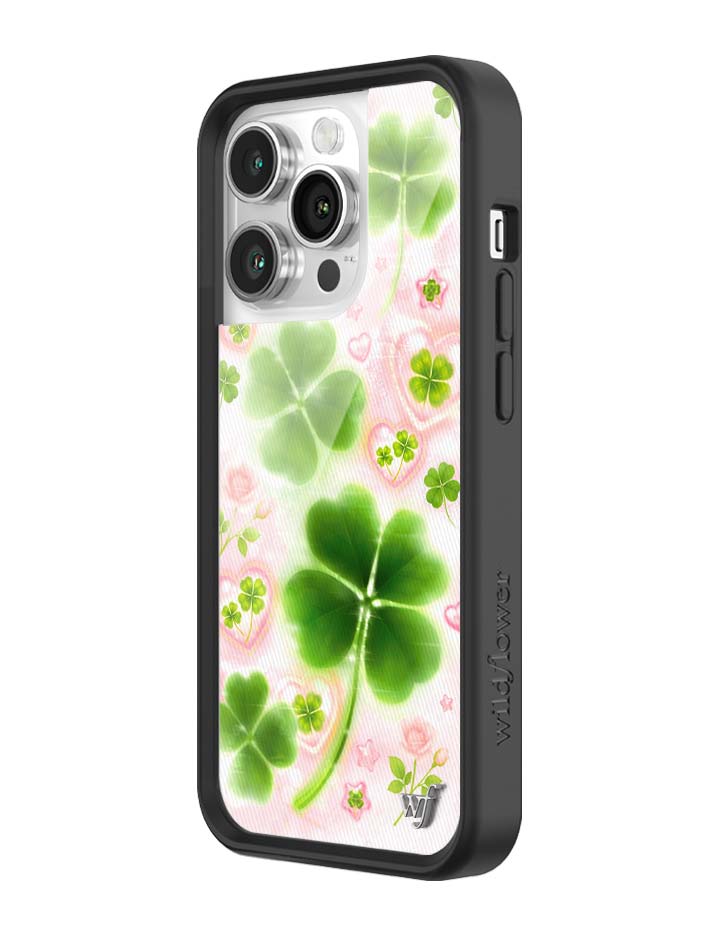 Phone case with green four-leaf clover design on a white background