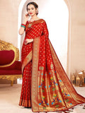Vibrant red Paithani silk saree featuring a rich sheen and matching unstitched blouse fabric.
