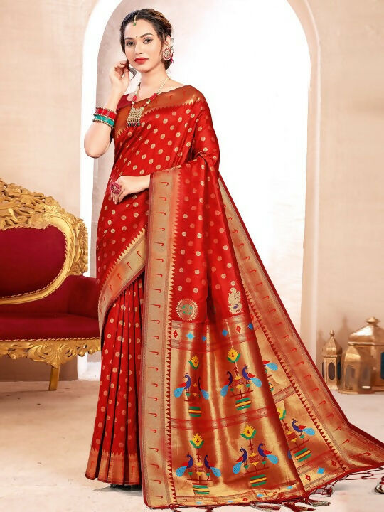 Vibrant red Paithani silk saree featuring a rich sheen and matching unstitched blouse fabric.