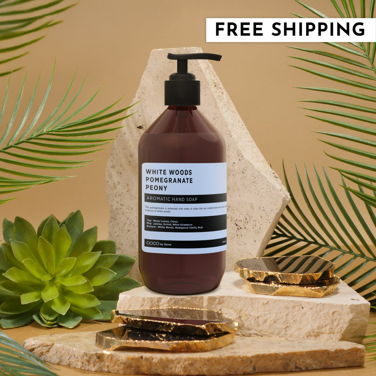White Woods Pomegranate Peony Aromatic Hand Soap in a modern brown pump bottle, displayed on a stone surface.
